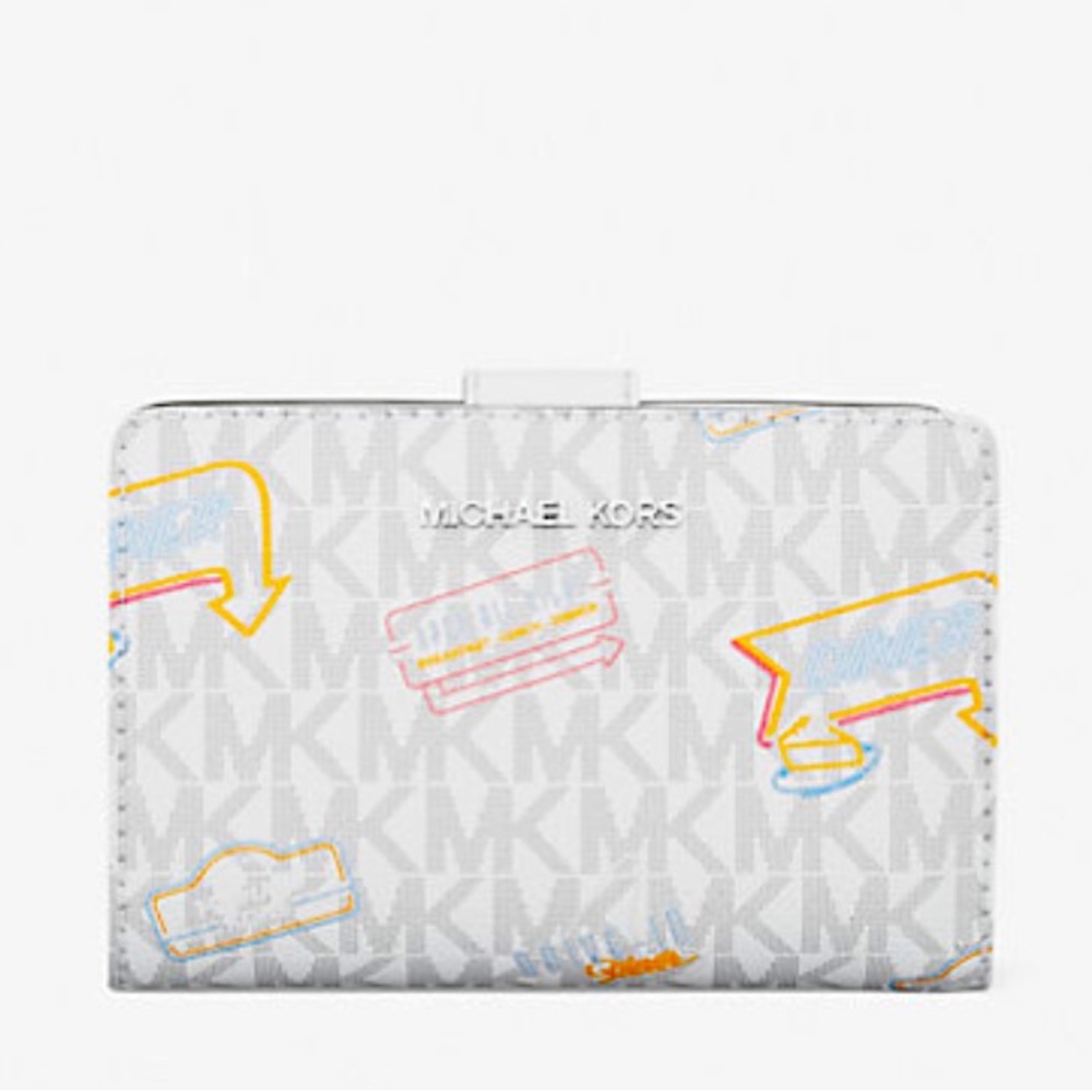 Michael Kors Jet Set Printed Signature
Logo Bi-Fold Wallet